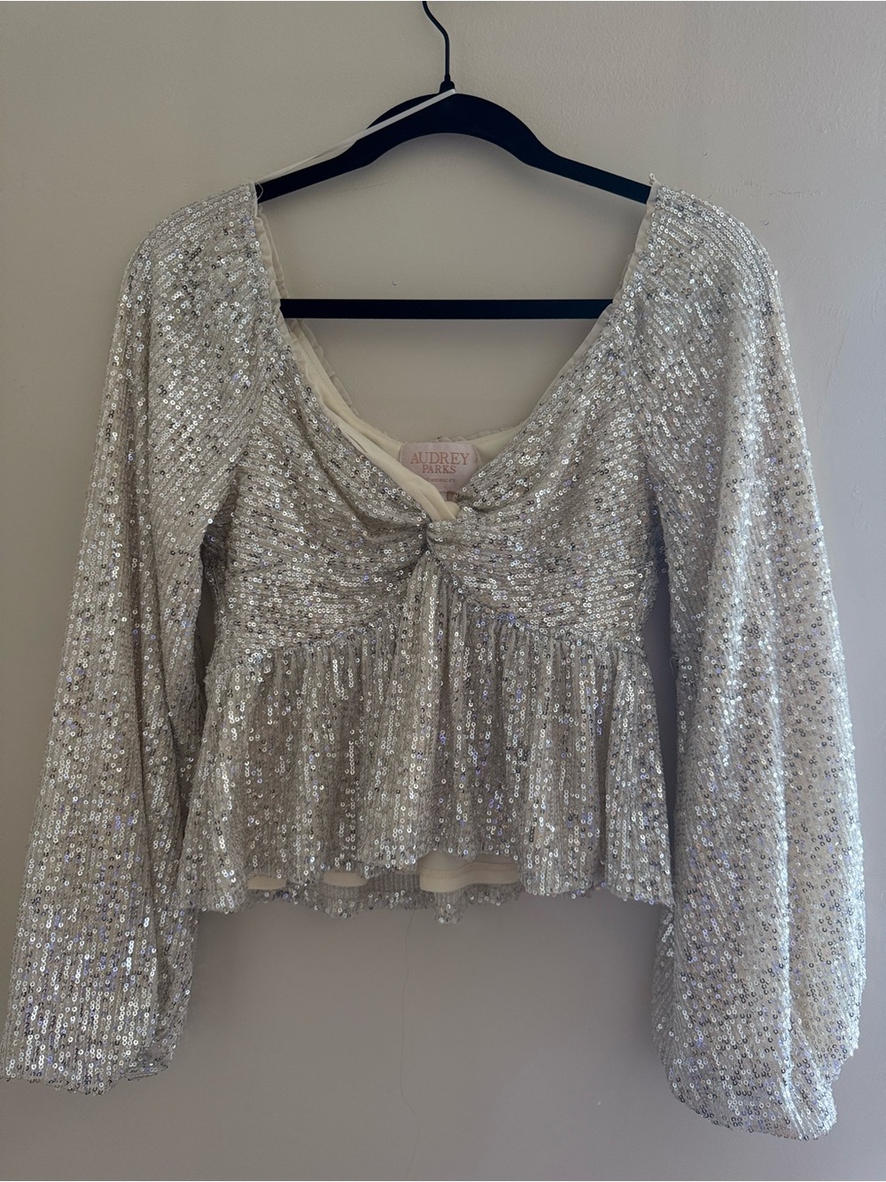 Francesca's Silver Sequin Long-Sleeve Peplum Top